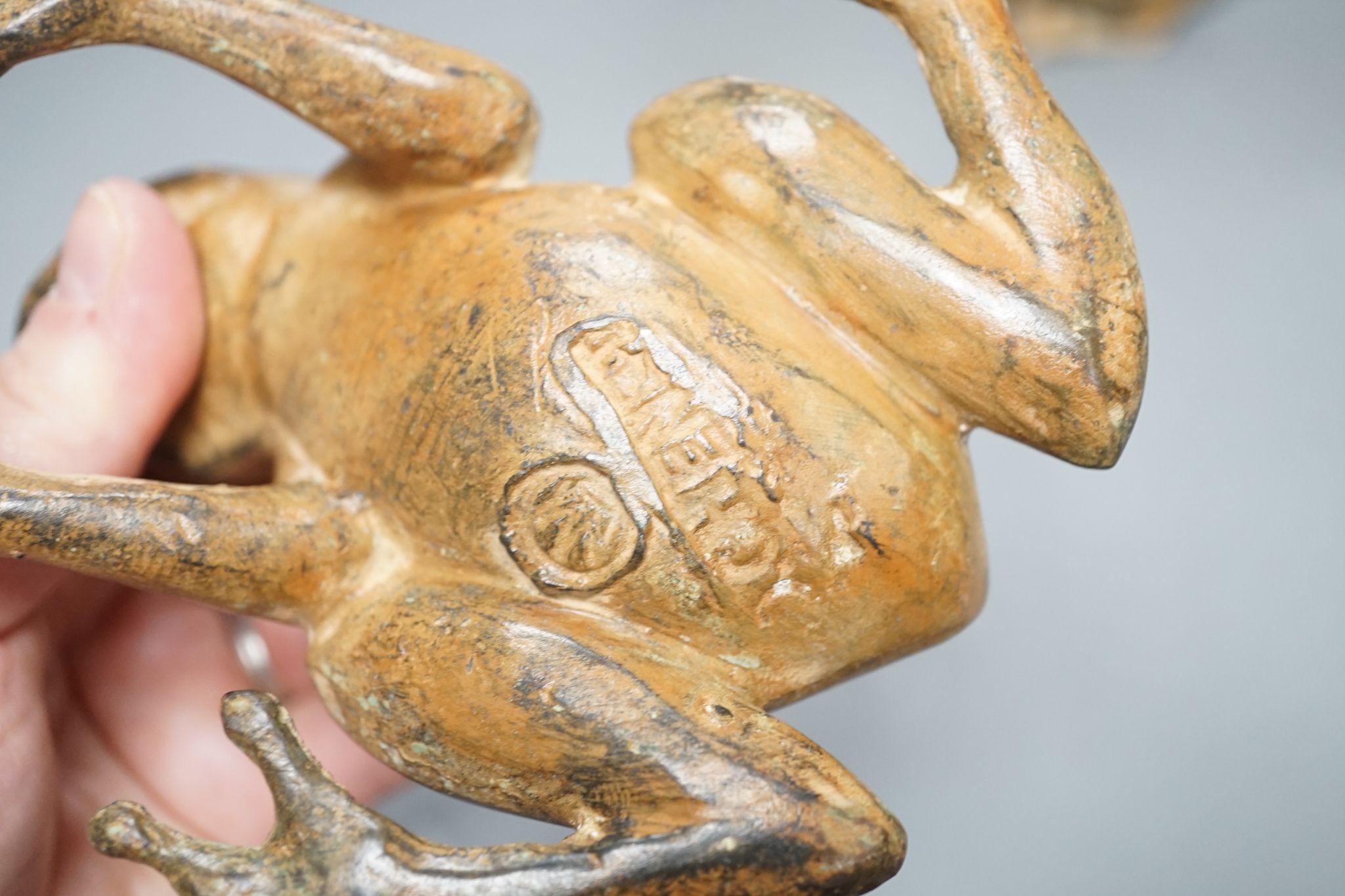 Pierre Chenet Foundry, four small patinated bronzes of a toad, two hares and a duck, largest 19cm high, signed